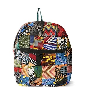 May include: A colorful patchwork backpack with a variety of patterned fabric squares in red, blue, yellow, and green. The backpack has a black zipper, a green handle, and a black zipper. The bag is a unique and stylish accessory.