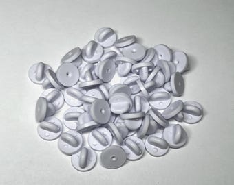 White rubber pin backs for lapel, hat pins, badges, and ribbon bars