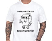Photo 1 of 8: Funny dad shirt with a playful milk carton art graphic and bold Built Different slogan, shown on a white tee for a cool papa outfit or fathers day gift, perfect for a dad joke shirt and family gag clothes with a clean, modern look