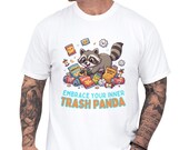 Photo 1 of 14: Cute raccoon graphic tee on a white unisex t shirt featuring a playful trash panda and the phrase Embrace Your Inner Trash Panda, a funny animal tee and cozy animal lover gift with a quirky sarcastic vibe