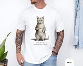 Photo 4 of 8: Charcoal unisex t shirt showing a vintage pencil sketch of a grumpy cat holding a coffee mug with faint "This Is My Tolerance Face" caption, cozy soft look ideal as a funny cat shirt, cat meme shirt and sarcastic t shirt — dry humor novelty cat tee and gift for him