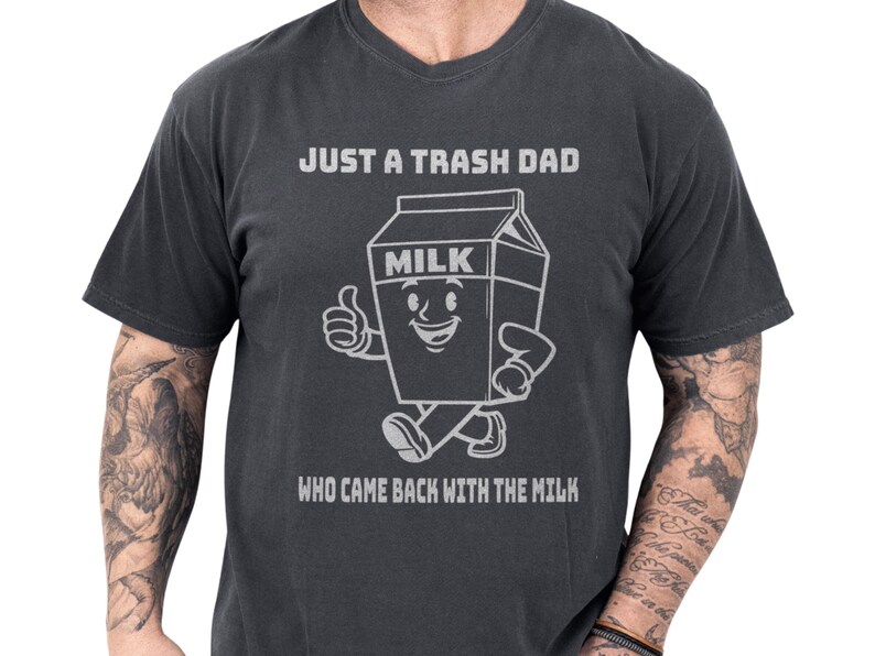 Funny dad shirt with a playful milk carton art graphic and the phrase Just a Trash Dad Who Came Back With the Milk, a cool papa outfit and fathers day gift idea with a bold retro feel, perfect gag gift shirt for family laughs