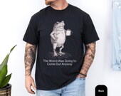 Photo 3 of 8: Soft black unisex t shirt showing a vintage sketch of a frog holding a coffee mug, quirky and sarcastic vibe for introvert humor fans, a funny frog shirt and frog graphic tee with meme energy, cozy rustic look, novelty graphic tee and gift for him