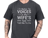 Photo 1 of 8: Soft charcoal vintage wash unisex tee with distressed white text reading I do whatever the voices in my wife's head tell me to do, a wife voices shirt and witty slogan shirt blending husband humor and married life humor, funny marriage tee and novelty quote tee perfect as a gag gift for husband and casual everyday wear