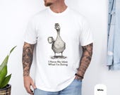 Photo 4 of 8: Charcoal unisex tee featuring a sketchy goose holding a coffee mug with the witty quote I Have No Idea What I'm Doing, soft vintage washed look, funny goose shirt and novelty tee for introvert humor, sarcasm lovers, cozy everyday humor apparel and gift for him or dad