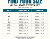 Photo 11 of 20: A sizing chart table for the Gildan 18000 sweatshirt listing chest width and length measurements in inches and centimeters for sizes small through 5XL.