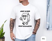 Photo 5 of 8: Funny dad shirt with a playful milk carton art graphic and the words Just a Dad who beat the milk allegations, a clever dad joke tee and fathers day gift for a cool papa outfit or family gag clothes with bold casual style