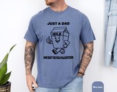 Photo 6 of 8: Funny dad shirt in soft blue with a playful milk carton art graphic and Just a Dad slogan, perfect as a fathers day gift, dad joke tee, or cool papa outfit for a relaxed family gag clothes look