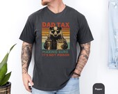 Photo 2 of 8: Soft garment dyed tee featuring a vintage sunset and a playful badger cartoon in sunglasses holding fries and a drink, cheeky dad tax shirt text reading making sure it's not poison, funny dad shirt and casual dad life tee perfect as a father's day gift