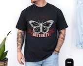 Photo 3 of 8: Black butterfly graphic tee on a model, featuring a vintage style anti social tshirt design with bold red lettering and edgy humor, perfect as a gift for introverts who love a cozy unisex funny shirt with understated rebel style