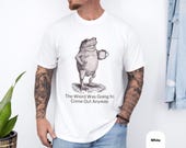 Photo 4 of 8: Charcoal unisex t shirt featuring a vintage sketch frog holding a coffee mug and the witty line about getting weird, a funny frog shirt and frog graphic tee with sarcastic, introvert-friendly humor and a cozy, slightly distressed look ideal as a quirky gift for him