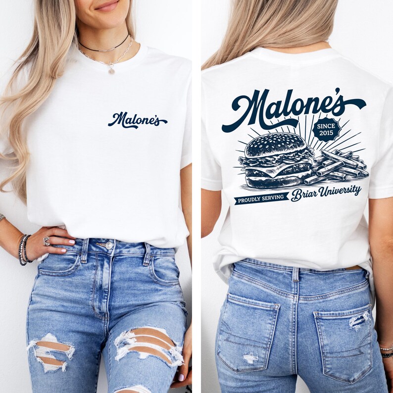 May include: White t-shirt with the word "Malone's" in navy blue script on the front. The back of the shirt features a burger and fries graphic with the text "Malone's Since 2015" and "Proudly Serving Briar University."