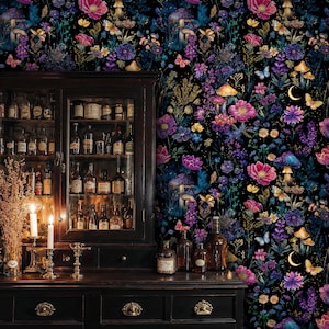 May include: An interior scene with a dark wooden cabinet and a floral wallpaper. The wallpaper features a pattern of flowers, mushrooms, butterflies, and a crescent moon against a black background. The color scheme includes blues, purples, and pinks.