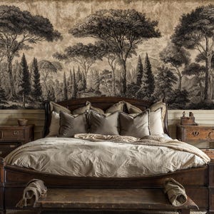 May include: A bedroom featuring a dark wood bed frame, neutral bedding, and decorative pillows. The headboard is arched. The wall behind the bed has a black and white forest mural. Two wooden bedside tables flank the bed.