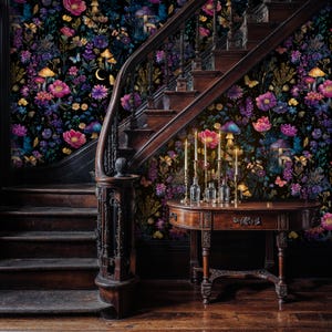 May include: An interior with a wooden staircase and a small table. The walls are adorned with floral wallpaper in shades of pink, purple, and yellow, with mushroom and butterfly motifs. Candles are lit on the table, creating a warm ambiance.