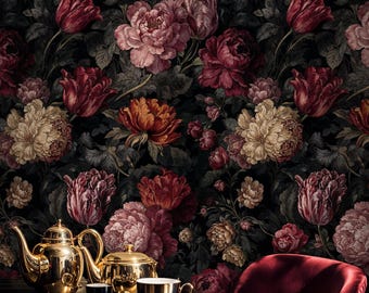 May include: A dark floral wallpaper featuring large, colorful flowers in shades of red, pink, and cream. A gold tea set with black cups and saucers sits on a round table, with a red velvet chair in the foreground.
