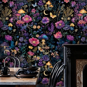 May include: A colourful floral wallpaper design with a dark background, showcasing flowers, mushrooms, butterflies, and a crescent moon. The colour scheme includes pink, purple, blue, and yellow. The wallpaper is used as a backdrop for a dining table and chairs.