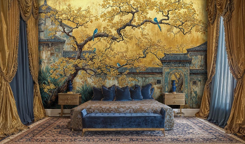 May include: A bedroom with a large mural depicting an Asian-inspired landscape with a golden yellow background, a tree with yellow leaves, and blue birds. The room features a bed with blue pillows, a blue bench, and gold curtains.
