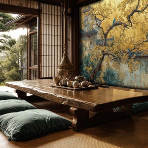 May include: A serene Japanese-style interior with a low wooden table and green floor cushions. A tea set sits on the table. The room opens to a view of a lush garden. A mural of a golden tree and a traditional building decorates the wall.