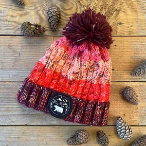 Gorro con pompón alpino