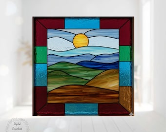 May include: Stained glass panel featuring a landscape with a yellow sun, blue sky, and rolling green hills. The panel is 7 inches by 7 inches and framed in a mix of red, green, and blue glass. The text "Meadow Sun" is at the top.