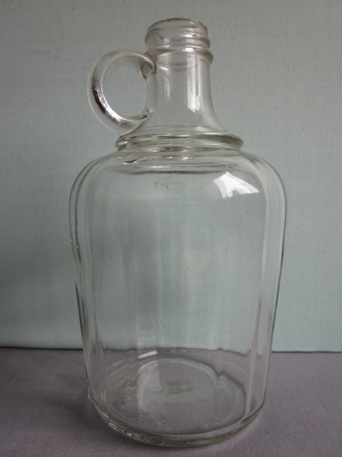 Vintage clear glass jug or bottle with loop handle Etsy
