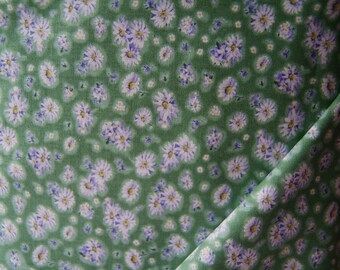Fabbies T-shirt fabric with insects on a green background