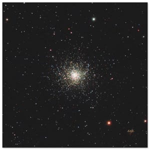 May include: A photograph of a globular cluster of stars against a black background. The cluster is a dense, spherical collection of stars, appearing as a bright, multi-colored core surrounded by a halo of fainter stars. The image captures the vastness of space.