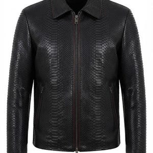 May include: A black jacket featuring a textured snakeskin pattern throughout the exterior. The garment includes a standard collar, long sleeves, and a central full-length zipper closure with dark hardware. Two side pockets are integrated into the front.
