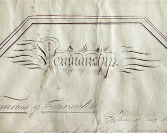 May include: Antique document with ornate calligraphy. The word "Penmanship" is written in elegant script within a decorative frame. The paper has a vintage, aged appearance with visible stains and creases, suggesting its age.