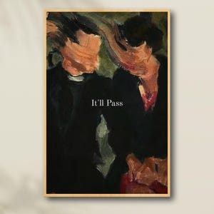 May include: Abstract art print in a wooden frame. The artwork features a dark background with brushstrokes of orange, red, and green. The words "It'll Pass" are printed in white at the bottom of the image.