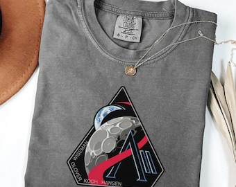 Camiseta unisex Comfort Colors® con el logo de la misión Artemis 2 de la NASA, camisetas de la NASA, regreso a la Luna, camiseta de lanzamiento de cohete.