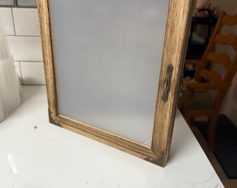 Deep shadow box made with Banded Tulip shells. Could be hung up on wall or displayed. Makes a great gift and could be used in any room!