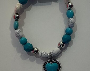 Turquoise beaded boho style bracelet with center charm
