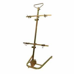 May include: A gold-toned metal vertical display stand featuring a triangular top handle, a central support pole, and two horizontal crossbars equipped with adjustable hooks. The base is constructed from a U-shaped metal frame for stability.