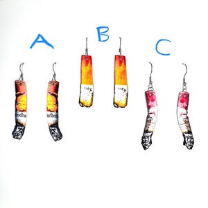 May include: A rustic wooden sign with the text "Welcome to our home" in white lettering. The sign features a distressed finish and a simple, inviting design, perfect for front door decor.