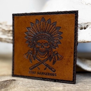 May include: A rustic wooden sign with the text "Welcome to our home" in white lettering. The sign features a distressed finish and a simple, inviting design, perfect for front door decor.
