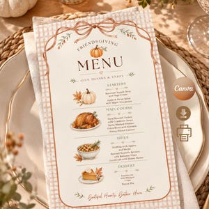 May include: A rectangular Friendsgiving menu card featuring a light brown gingham border, a decorative bow at the top, and illustrations of a pumpkin, roasted turkey, and autumn leaves. The text lists starters, main course, sides, and dessert.