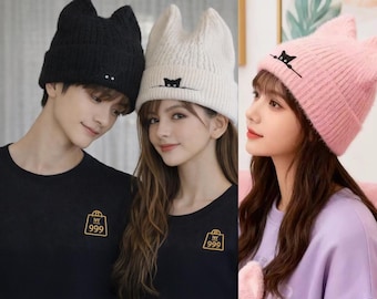 Gorro de punto con orejas de gato, cálido, suave y acogedor, en rosa, negro y blanco.