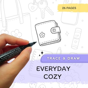May include: A black marker drawing a wallet on a white page featuring 26 pages of line art. The page includes illustrations of a tote bag, keys, lip balm, and a notebook with the text Trace & Draw Everyday Cozy printed in a purple banner.