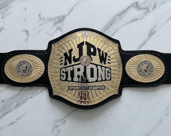 Pas mistrzowski NJPW Strong Openweight z mosiężnymi płytkami i czystą skórą