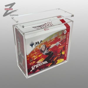 May include: A clear acrylic display case containing a Marvel Spider-Man Magic: The Gathering collector booster box. The box features artwork of Spider-Gwen, the text Spider-Man, and the text Collector Boosters. The case has a sliding lid.