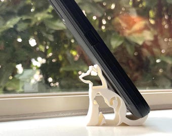 Soporte para teléfono impreso en 3D con forma de gato y perro