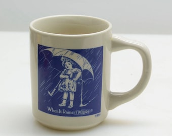 Vintage 1980's Morton Salt Coffee Mug Girl Under Umbrella, When It Rains It Pours, from 1914 Advertisement, Adorable Girl in Blue Rain