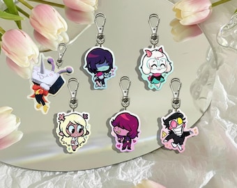 Deltarune 4 Variations Keychains, Spamton and Tenna Baby, Spamton Susie Ralsei meme keychain, is a bag accessory and a fan gift.