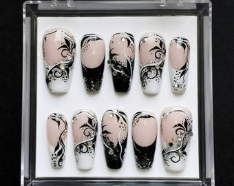 Uñas postizas con diseño de remolino blanco y negro, puntas francesas con efecto degradado y purpurina, set de arte floral.