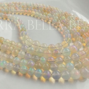 8" light gold AAA Ethiopian WELO OPAL smooth gem stone round beads 4mm - 5mm