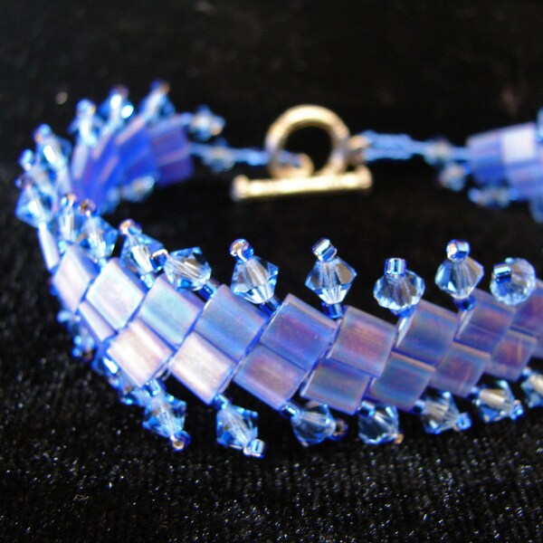 Woven blue tila and crystal bracelet