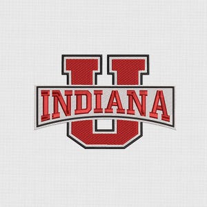 May include: A white ceramic mug with a black handle and the text "But First, Coffee" in a black, bold font. The mug is sitting on a wooden surface.