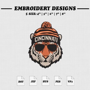 Pode incluir: Um design de bordado com um tigre usando um gorro listrado laranja e preto com pompom e óculos de sol. O texto diz CINCINNATI. Inclui 5 tamanhos: 4", 5", 6", 7", 8" e formatos de arquivo DST, JEF, HUS, PES e VP3.